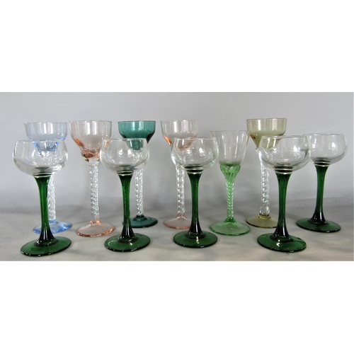 719 - A mixed miscellaneous lot to include a collection of vintage coloured goblets with barley twist stem... 