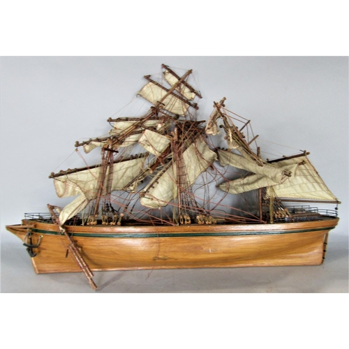 729 - A scale model of a three mast vessel , 70cm long