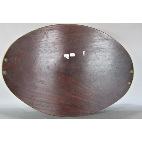 731 - A large flame mahogany oval twin handled gallery tray, 77 x 53cm