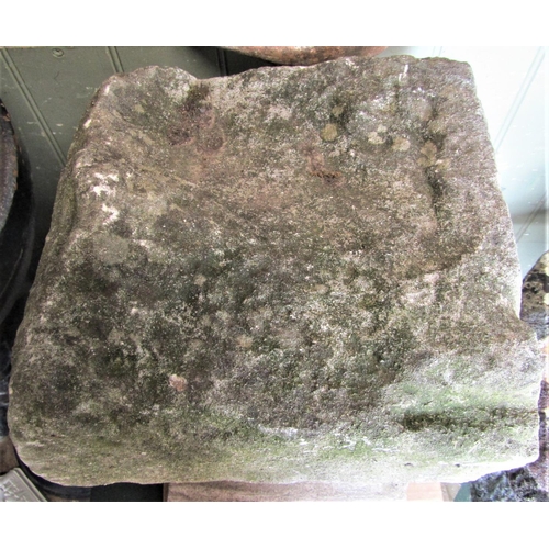 2176 - A small/squat weathered natural stone staddlestone, of square tapered form with square cap, 44cm hig... 