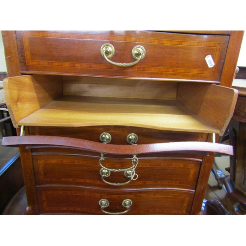 2784 - An inlaid Edwardian sheet music cabinet, the shaped top over an open alcove, the five drawers with s... 