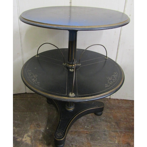 2804 - A mid Victorian period two tier centre table, each tier of circular form with repeating geometric de... 