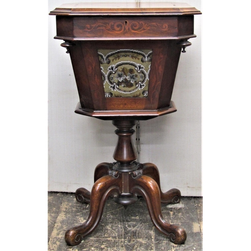 2817 - A Victorian walnut ladies sewing table, the rising lid revealing a segmented interior, the tapering ... 