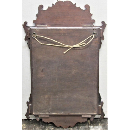 2836 - A small Georgian style wall mirror, with fretted outline and burr walnut veneers with applied shell ... 