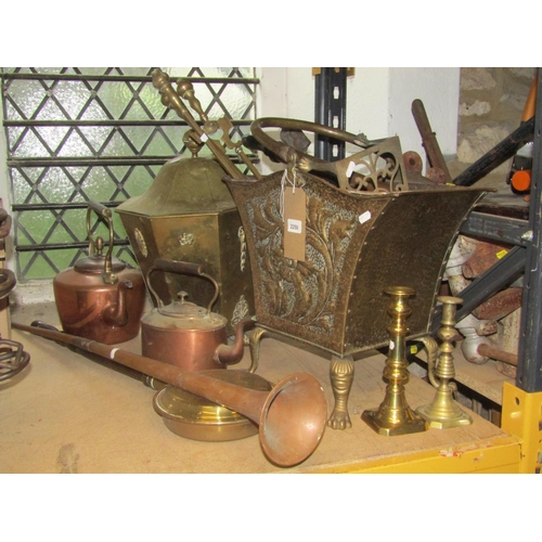 2250 - One lot of copper and brass ware to include a brass coal bucket with shaped outline and embossed flo... 