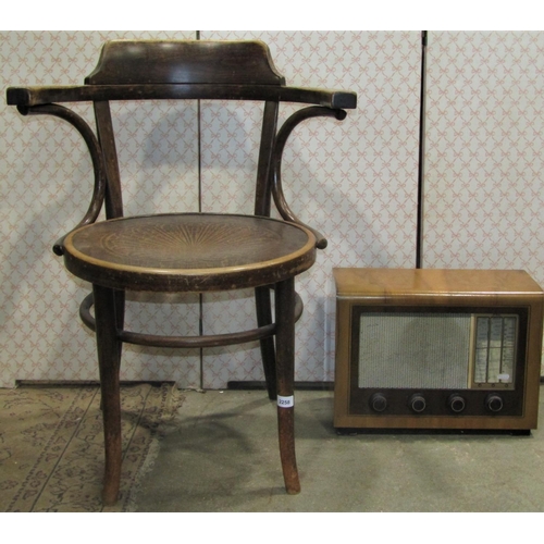 2258 - A late Victorian mahogany open elbow chair with moulded bar back over a worn leather upholstered sea... 