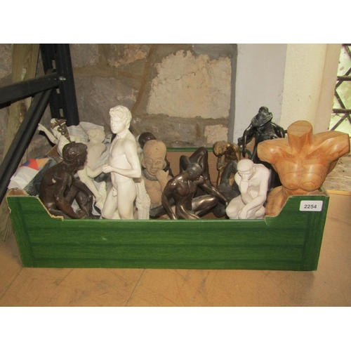 2254 - Two boxes of homo erotica figure groups and carvings, mixed materials