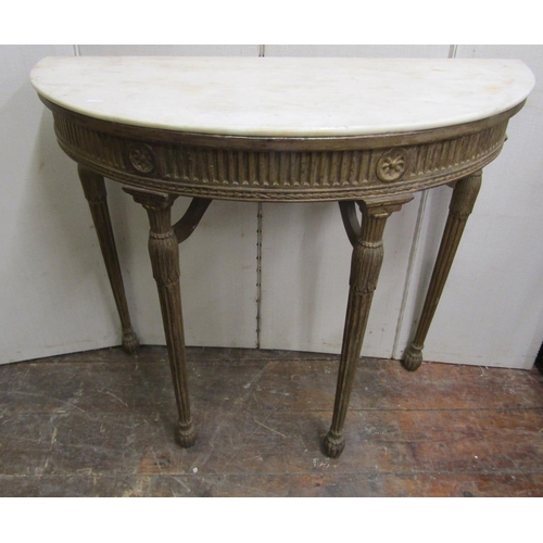 2809 - A Georgian demi-lune side table set beneath a white marble top, the carved framework with repeating ... 