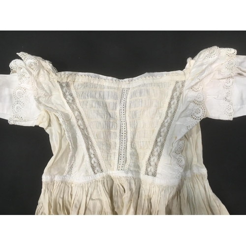 1607 - 15 white baby gowns in white cotton and wool, including 19th century hand stitched gowns trimmed wit... 