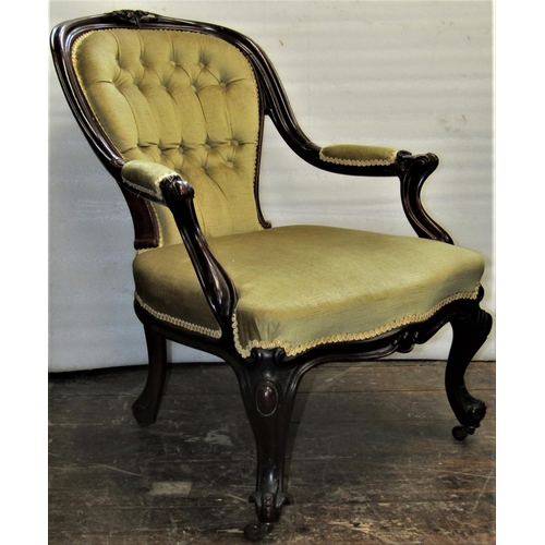 2816 - A Victorian walnut drawing room chair, with carved and moulded showwood frame raised on cabriole sup... 