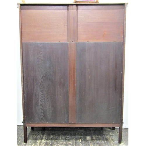 2819 - An art nouveau side cabinet with geometric marquetry panels to a central leaded light door on square... 