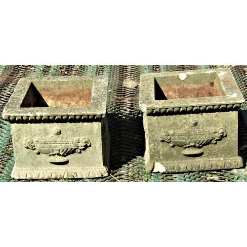 2079 - A pair of small reclaimed square cut garden urns, with classical repeating fluted and egg and dart d... 