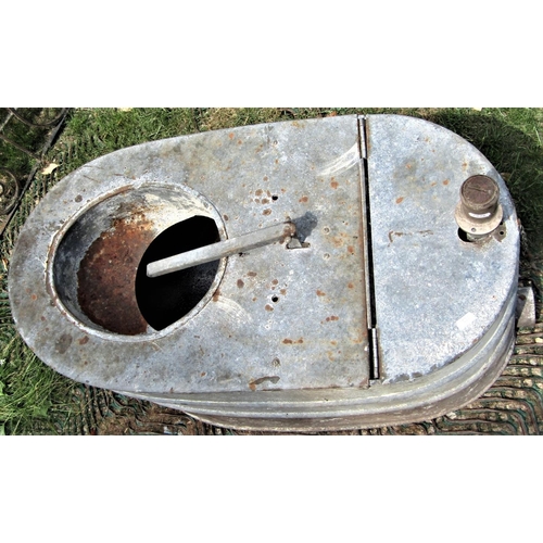 2099 - A reclaimed galvanised steel ships toilet of oval form with hinged lid and some fittings, 78 cm long... 