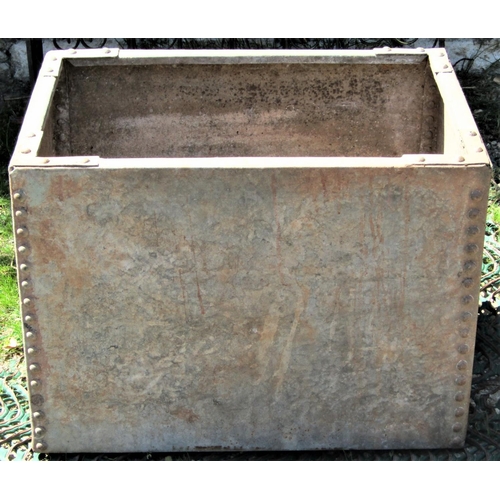 2102 - A reclaimed galvanised steel water tank of rectangular form with pop riveted seams, 61 cm long x 44 ... 