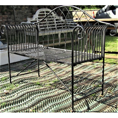 2112 - A Regency style two seat painted light metal garden bench with arched lattice back, scrolled arms, s... 