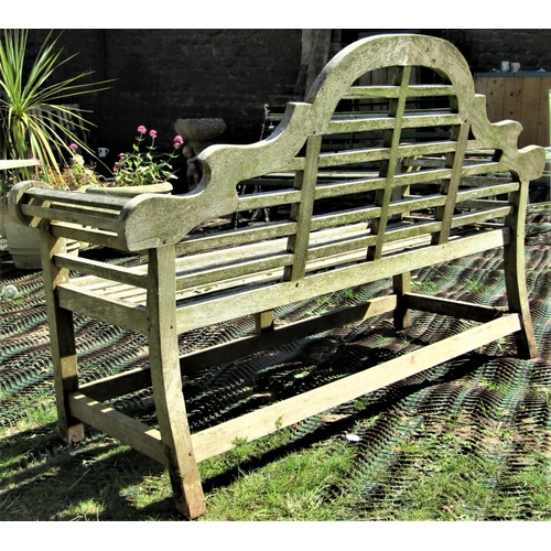 2124 - A weathered teak Lutyens style three seat garden bench 165 cm long (weathered splits to scrolled arm... 