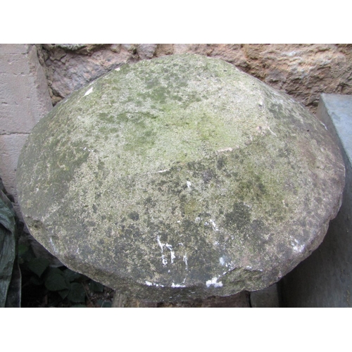 2100 - A rough hewn natural stone staddle stone of square tapered form with domed cap, 100 cm in height app... 