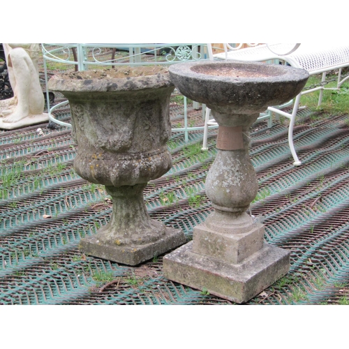 2209 - A reclaimed campana shaped planter with swag detail, fluted column and square cut base, together wit... 