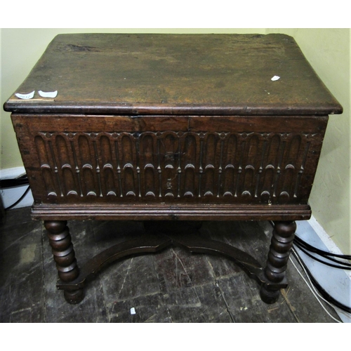 2812 - A Georgian oak bible box with repeating geometric detail, raised on a later stand with bobbin suppor... 