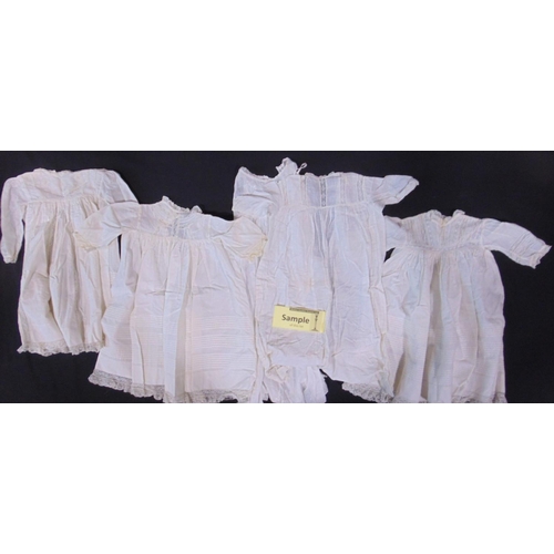 1629 - Suitcase containing 15 late 19th/ early 20th century white baby gowns, many with hand made lace trim... 