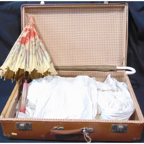 1629 - Suitcase containing 15 late 19th/ early 20th century white baby gowns, many with hand made lace trim... 