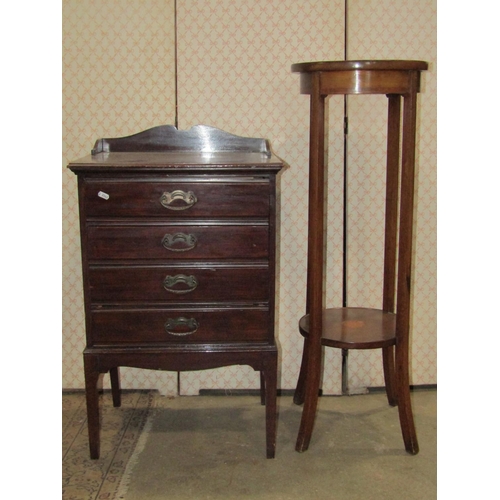 2324 - An inlaid Edwardian mahogany dressing chest of three long drawers raised on splay bracket supports t... 