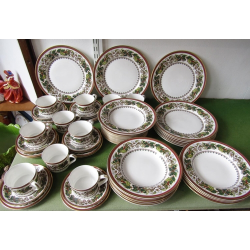 66 - A collection of Spode Christmas Rose pattern wares comprising ten dinner plates, ten dessert or soup... 