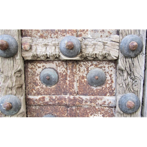 66 - An antique Indian hardwood panel with carved detail, the centre section in steel and brass overlaid,... 