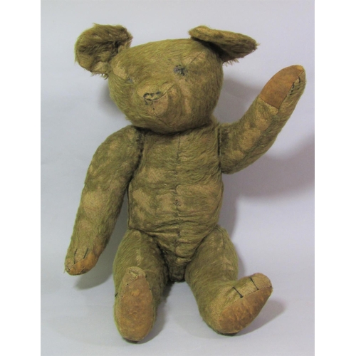 670 - A pre WW2 vintage teddy bear, possibly by Merrythought, with jointed body, original paw pads, large ... 