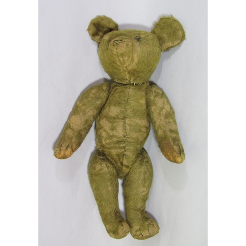 670 - A pre WW2 vintage teddy bear, possibly by Merrythought, with jointed body, original paw pads, large ... 