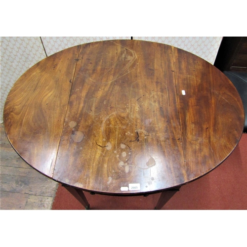 2158 - A Georgian mahogany and oak lined Pembroke table of oval form, raised on square tapered legs with br... 