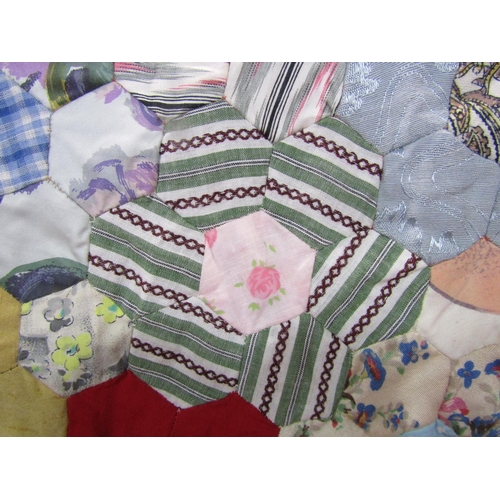 483 - Vintage traditional patchwork quilt with multi coloured hand stitched hexagonal 'flowers' surrounded... 