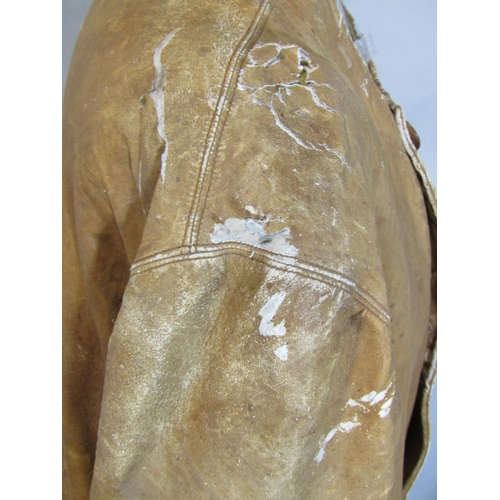 484 - 1920's/30's motoring / military coat or duster jacket in soft tan leather; single breasted with butt... 