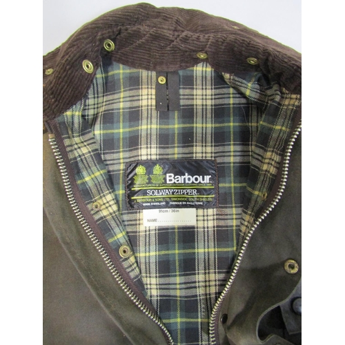 485 - Gents Barbour waxed jacket 'Solway Zipper' with brown corduroy collar and tartan lining. Size 36 che... 