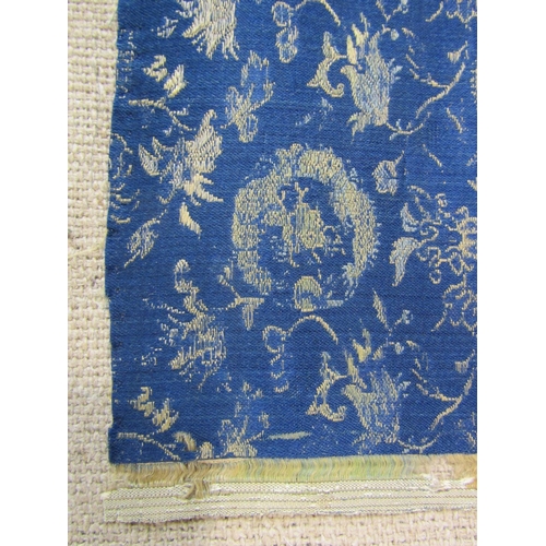 500 - Sample of antique embroidered Chinese silk fabric, woven on a narrow loom with gold weft and blue wa... 