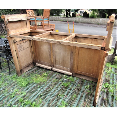 1576 - A bespoke oak floorstanding side cupboard enclosed by three rectangular panelled doors with applied ... 