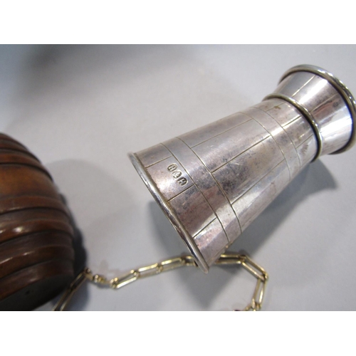 458 - A silver plated churn shaped pepper mill, a small gold plated bracelet and a treen barrel (3)