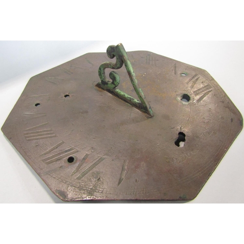 461 - An 18th Century octagonal sundial with engraved detail signed Hedger London 20cm