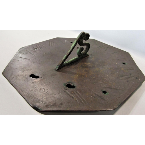 461 - An 18th Century octagonal sundial with engraved detail signed Hedger London 20cm