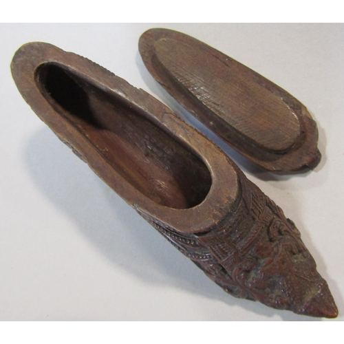 464 - A good antique treen snuff box in the form of a ladies shoe 12 cm, pipe casing 29 cm, profusely carv... 