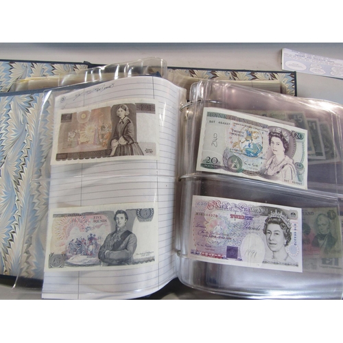 473 - An album containing bank notes including two English £20 notes, further Scottish £20 notes, further ... 