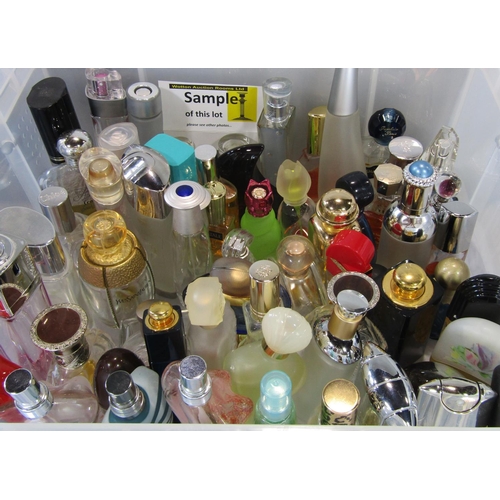 521 - Large quantity of empty perfume bottles by various designers including Dior, Yves Saint Laurent and ... 