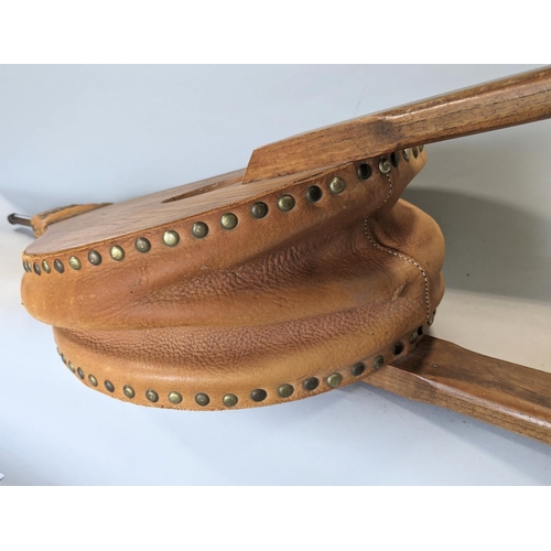 568 - A very large pair of domestic bellows in elm and leather, 86 cm in length