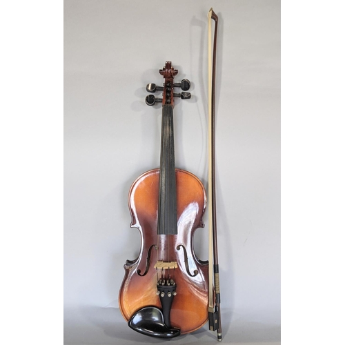 569 - A Czechoslovakian students violin - Tatra by Rosetti with case and bow, (three quarter size)