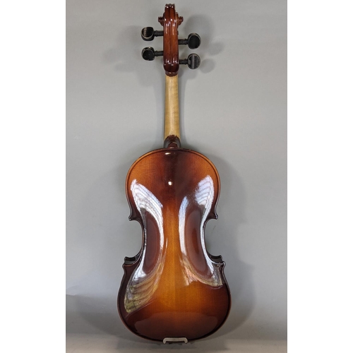 569 - A Czechoslovakian students violin - Tatra by Rosetti with case and bow, (three quarter size)