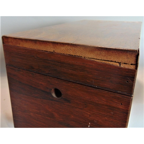 597 - 19th century rosewood tea caddy, the hinged lid enclosing two further rosewood hinged lid boxes and ... 