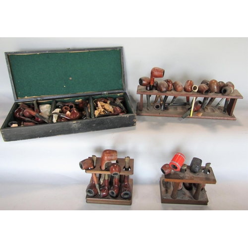 633 - A large collection (in excess of 50) of antique and vintage tobacco pipes including models such as t... 