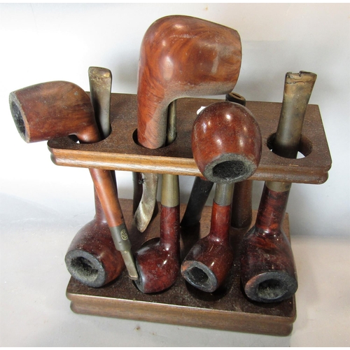 633 - A large collection (in excess of 50) of antique and vintage tobacco pipes including models such as t... 