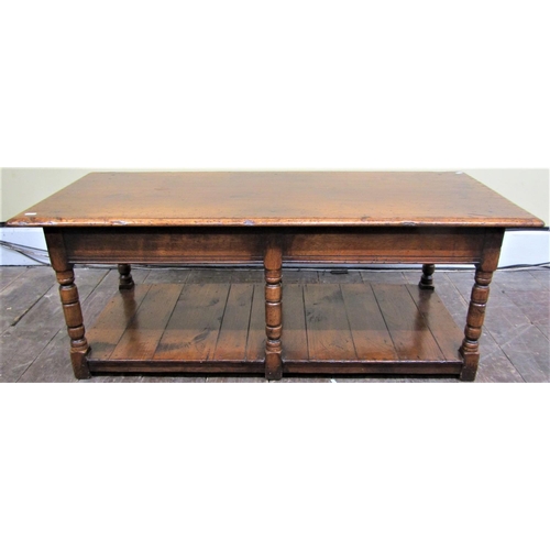 2136 - A good quality reproduction oak centre or occasional table, raised on six turned supports with under... 