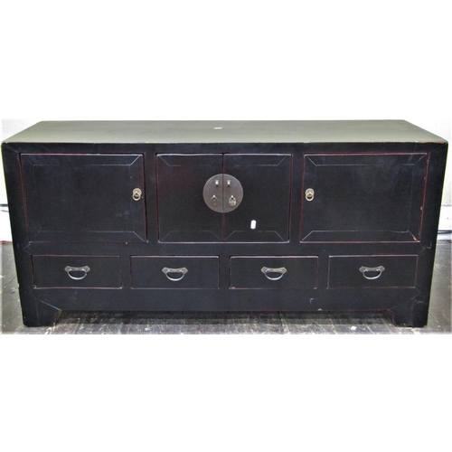 2137 - A Chinese black ground side cupboard enclosed by three cupboards and four drawers with applied brass... 